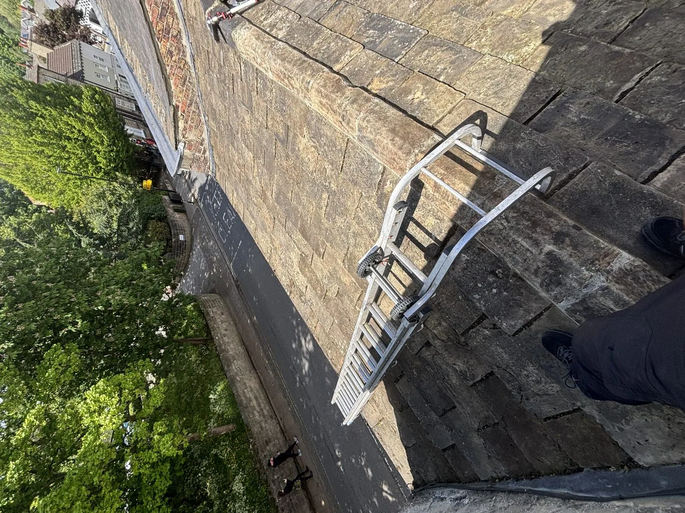 Stone slate roof after cleaning — Knaresborough, original patina preserved