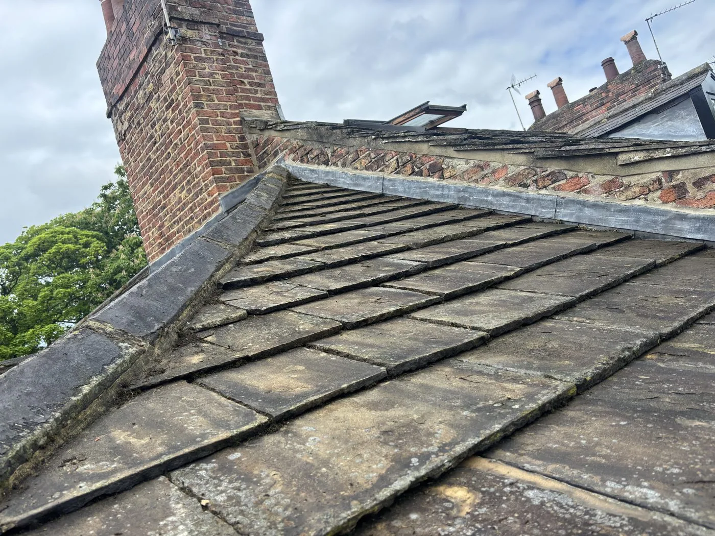 Roof ladder in position on stone slate roof — 118 High Street Knaresborough, High Street below